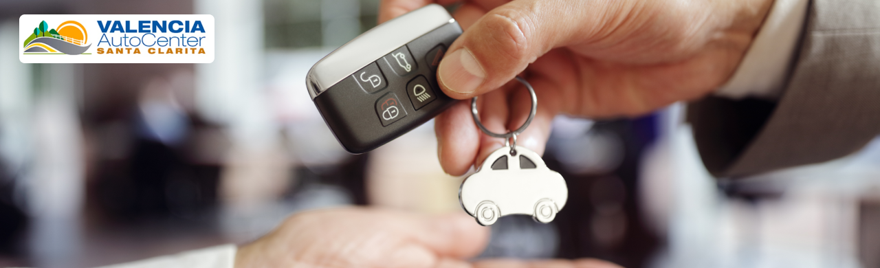 Santa Clarita driver receiving keys to their new vehicle at Valencia Auto Center.