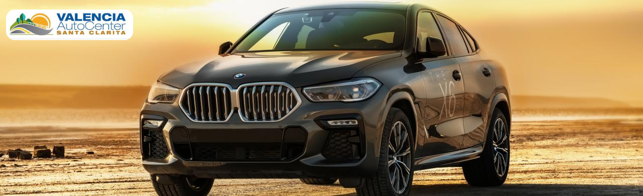  A sleek new BMW parked outside Valencia Auto Center showcasing current BMW lease deals