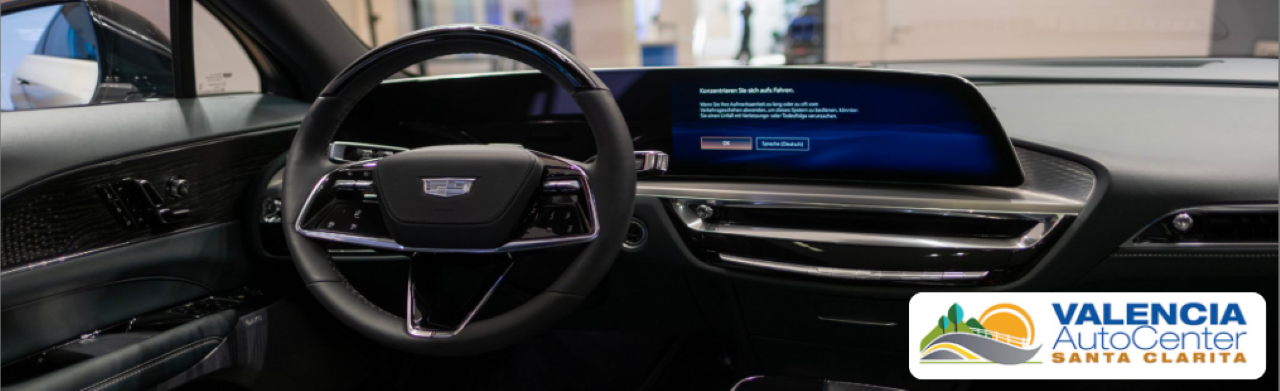 Shoppers browsing a variety of new and used cars, trucks, and SUVs at the auto mall in Valencia, California.
