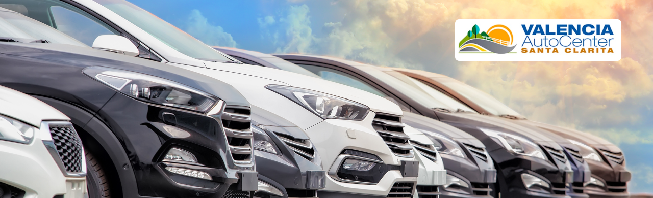 Customers browsing affordable vehicles for sale in Santa Clarita at the Valencia Auto Group dealership