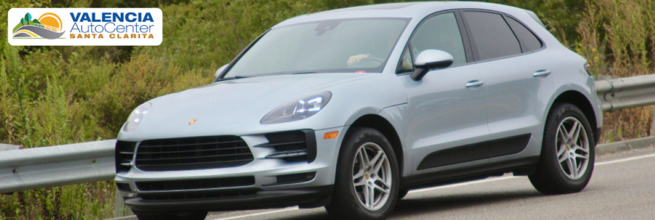 Used SUVs parked at Valencia Auto Center, showcasing a wide variety of makes and models along the Magic Mile.