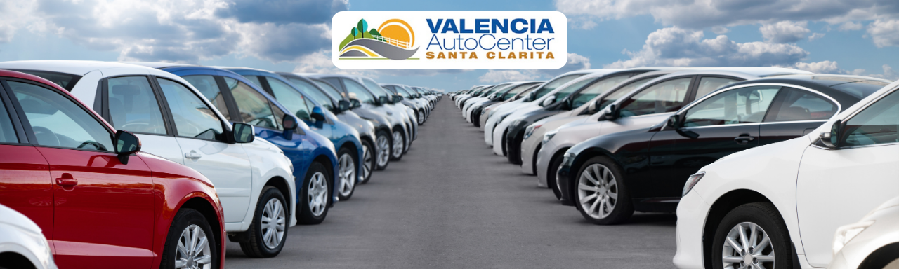 Lineup of new and pre-owned cars for sale at Valencia Auto Center, Santa Clarita lot