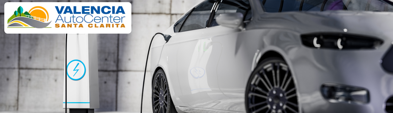 Close-up of a 2023 electric car interior and dashboard at Valencia Auto Center, highlighting modern EV technology.