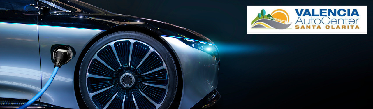 Modern electric SUV charging at a public station near Valencia, California