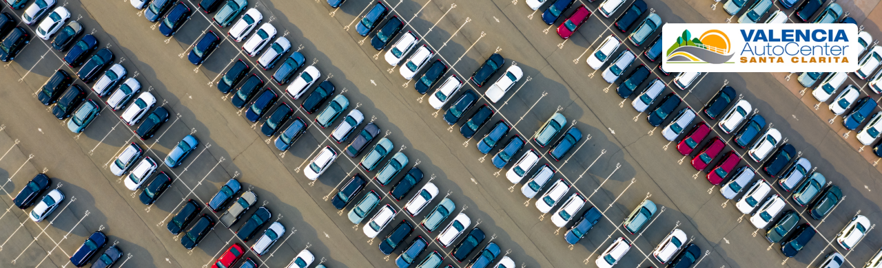 Electric minivan parked at Valencia Auto Center serving Santa Clarita families