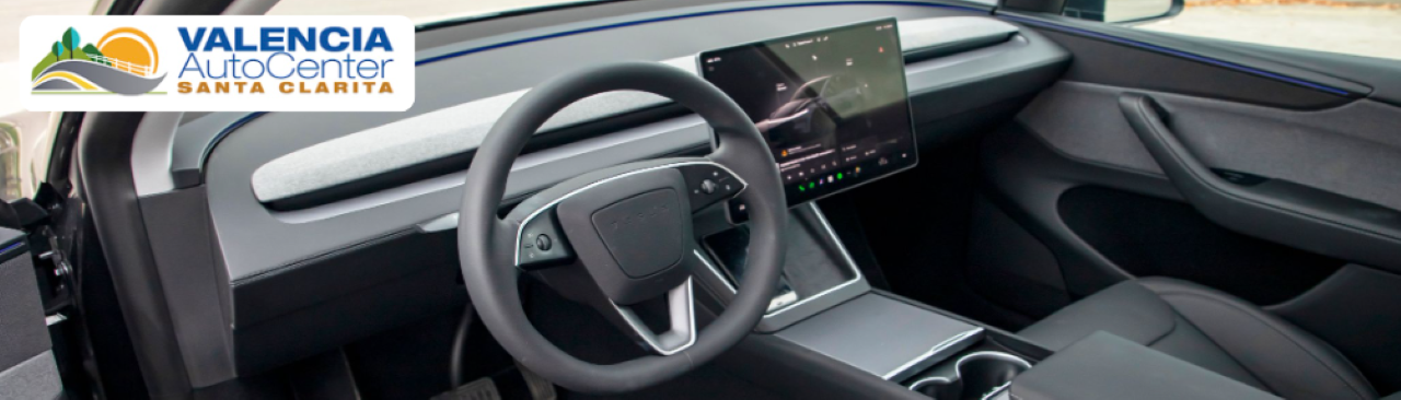  Modern electric SUV parked at Valencia Auto Center, showcasing eco-friendly design and aerodynamic styling.