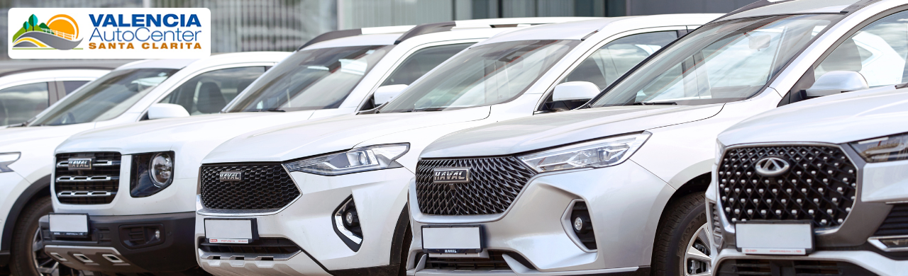 Customer test-driving an SUV at Valencia Auto Center near Santa Clarita Valley