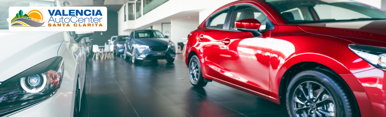 A row of fuel-efficient cars for sale at Valencia Auto Center in Santa Clarita, CA