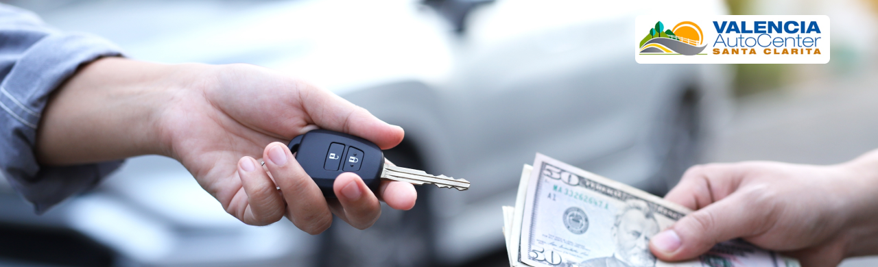 Customer selling a used vehicle at Valencia Auto Center in Valencia CA with in-person appraisal and trade-in options