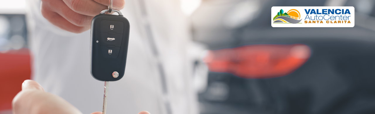 Driver getting a local car appraisal at Valencia Auto Center in Santa Clarita Valley comparing sell my car options vs CarMax