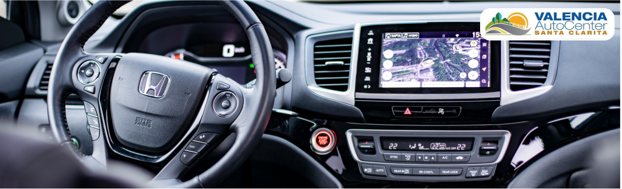 Interior of Honda CR-V at Valencia Auto Center with modern features and technology