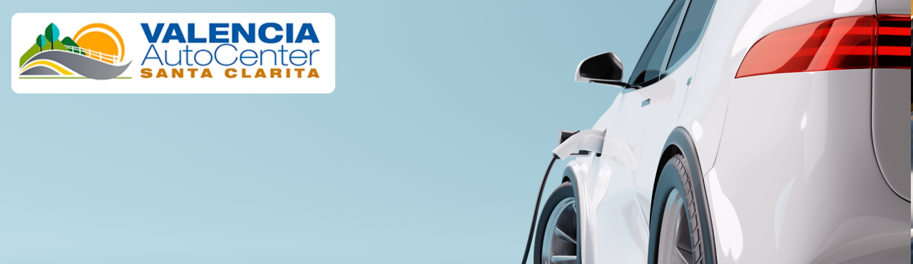 Electric car plugged into a Level 2 home charger at a modern California home.