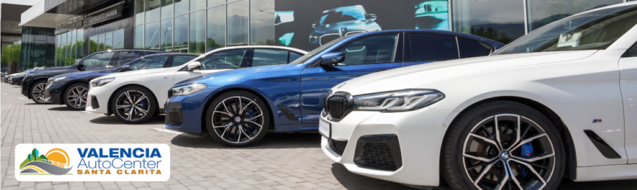 Customers exploring diverse car brands side by side at Valencia Auto Center in Valencia, CA