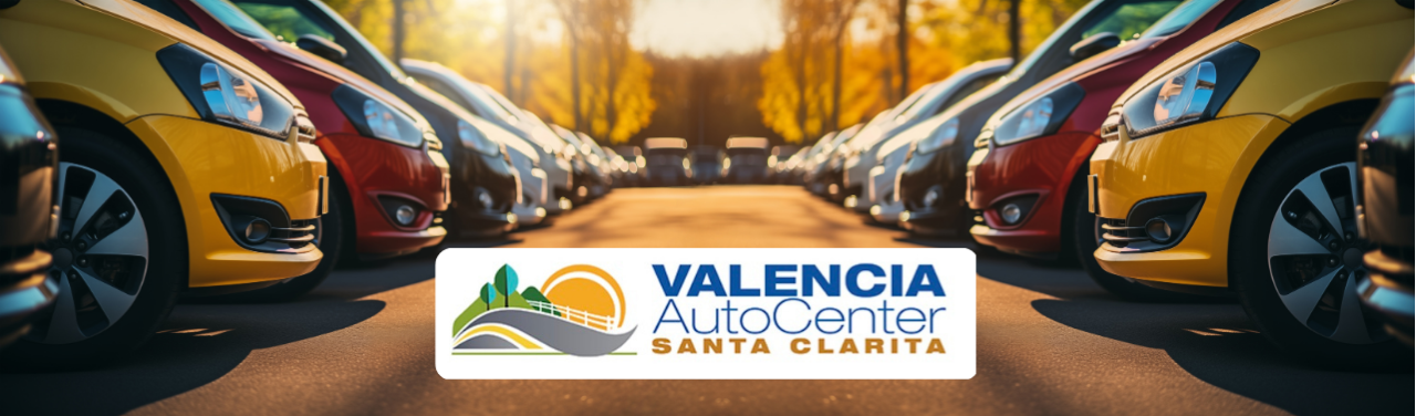Customer browsing new car trims inside the Valencia Auto Center showroom