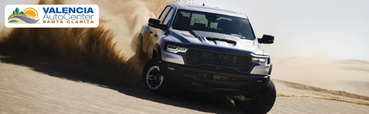 RAM truck hauling heavy equipment, showcasing towing capability in Southern California.