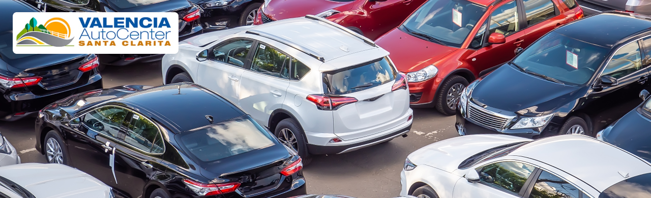 Shoppers browsing cars at Valencia Auto Center in Santa Clarita’s Magic Mile.