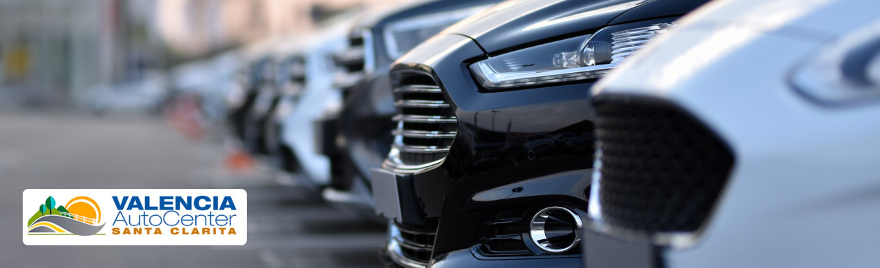 Pre-owned compact vehicles under $5,000 on display at the Valencia Auto Center lot