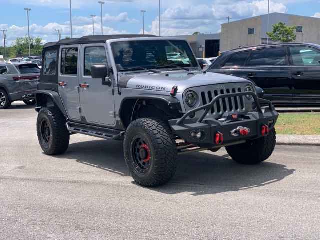 used 2013 Jeep Wrangler Unlimited car, priced at $18,655