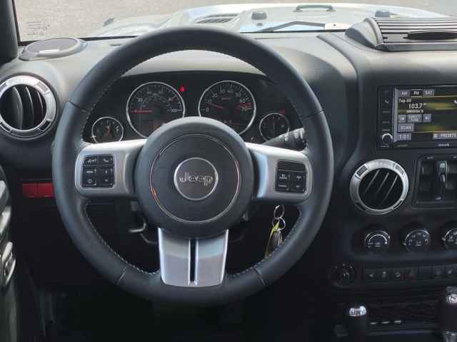 used 2016 Jeep Wrangler Unlimited car, priced at $25,226