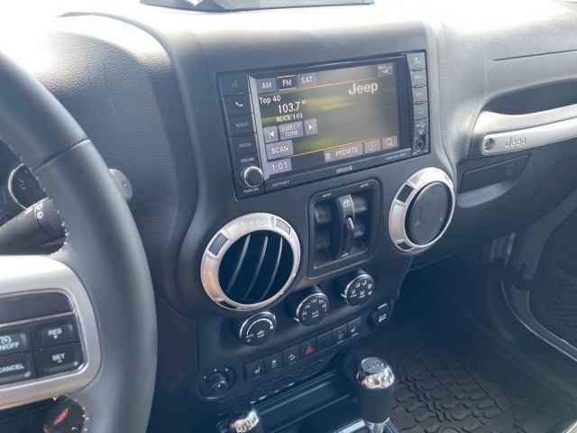 used 2016 Jeep Wrangler Unlimited car, priced at $25,226