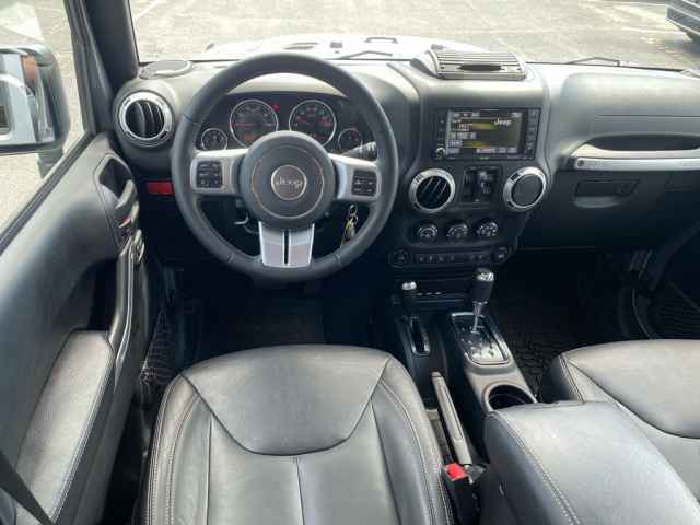 used 2016 Jeep Wrangler Unlimited car, priced at $25,226